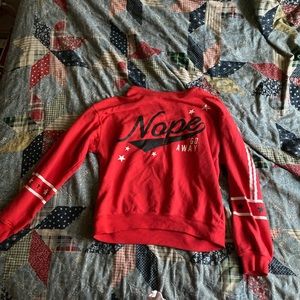 Sweatshirt,crop tops, a dress, a v-neck t-shirt